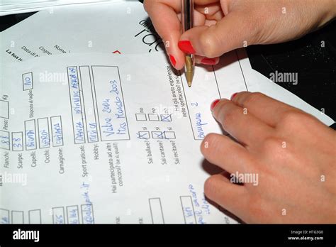 Woman Signing Paper Document Or Fill Out Form Stock Photo Alamy