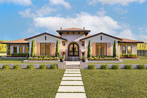 Mediterranean House Plan With Expansive Layout And Two Way Fireplace