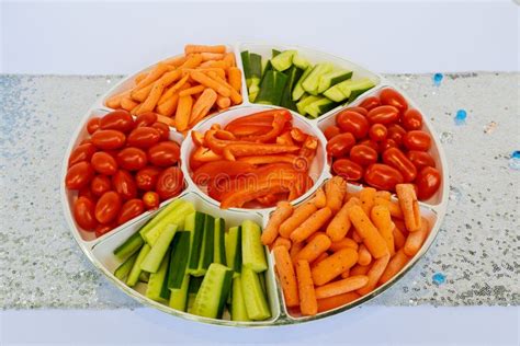 Fresh Vegetables Snack Carrots Sweet Pepper Cucumbers And Tomatoes