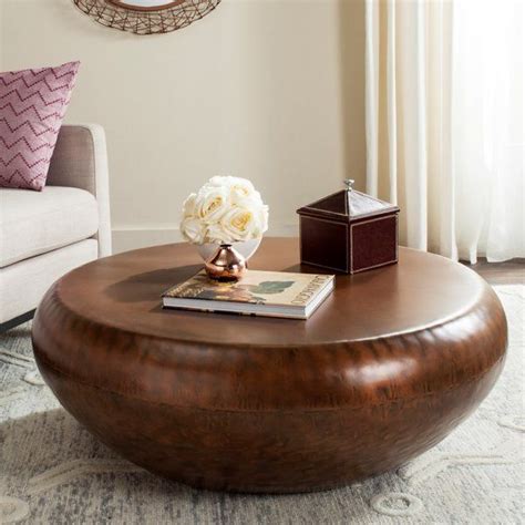 This round piece is built from sturdy squared iron with a wide round base. Drum Coffee Table | Copper coffee table, Drum coffee table ...