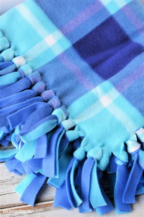 Fleece tie blankets are a great way to go for winter. How to make a fleece tie blanket - easy no sew fleece ...