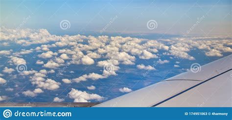 Flying Over The Puffy Popcorn Clouds Stock Image Image