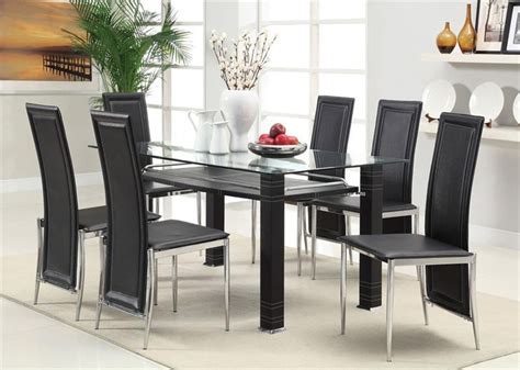 This dining set includes the perfect glass table for modern apartments with four matching velvet dining chairs. 20 Ideas of Glass Dining Tables Sets | Dining Room Ideas