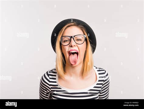 Young Beautiful Girl Sticking Tongue Hi Res Stock Photography And