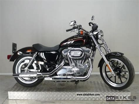 The category is custom / cruiser. 2011 Harley Davidson Sportster 883 LOW