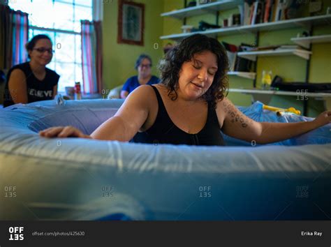 Woman In A Birthing Tub During A Home Delivery Stock Photo Offset