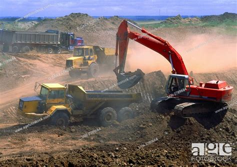 Heavy Equipment Working On A Road Construction Stock Photo Picture