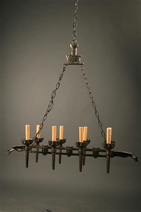 Antique French Wrought Iron 8 Arm Castle And Shield Chandelier