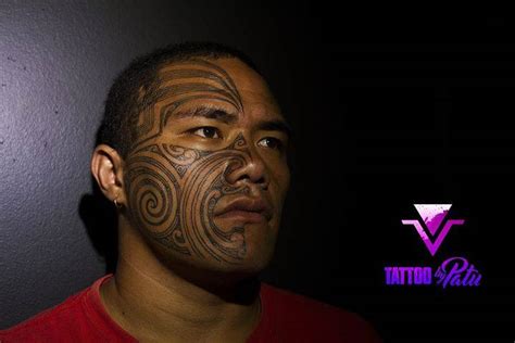 Polynesian Style Half Face Tattoo