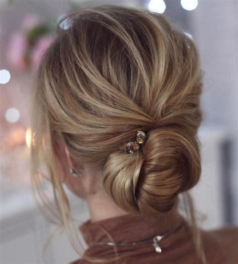 A very simple, elegant hairstyle is the top knot. 30 Quick and Easy Updos for Long Hair