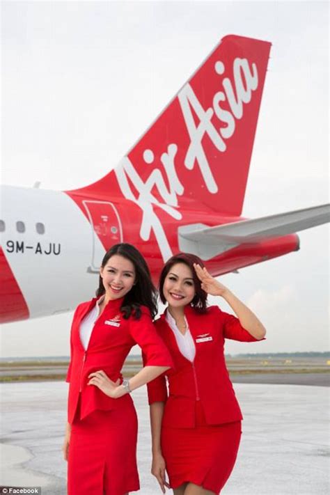 Woman Disgusted By Air Asia Flight Crew Uniforms Daily Mail Online
