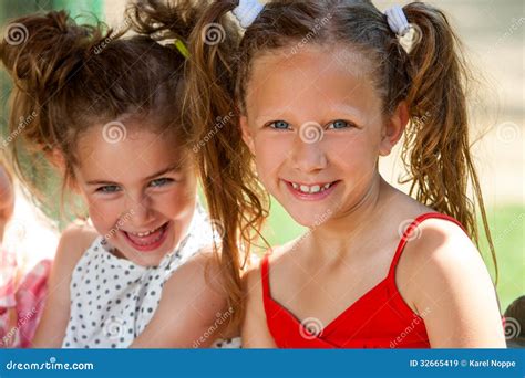 Portrait Of Two Ponytailed Girls Stock Image Image Of Holiday