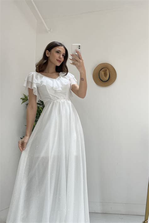 Modakapimda Beyaz Beli Eritli Simli Uzun Abiye Elbise Elbisebul