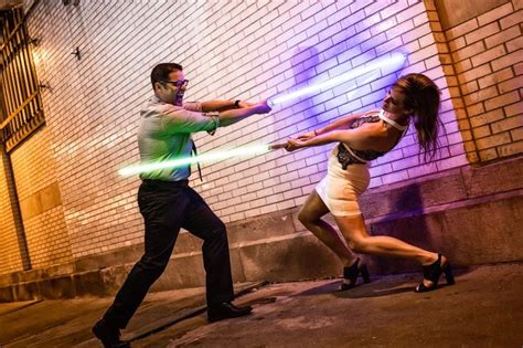 Lightsaber Battle Between Couple Star Wars Engagement Photo Shoot Idea In Downtown Ch Star