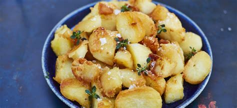 Put the potatoes into a large saucepan, cover with cold salted water and bring to the boil; Recipe: How to make the best crispy roast potatoes ever ...