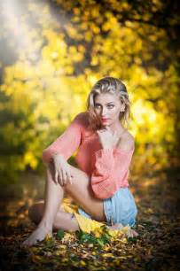 Beautiful Elegant Woman With Long Legs In Autumn Park