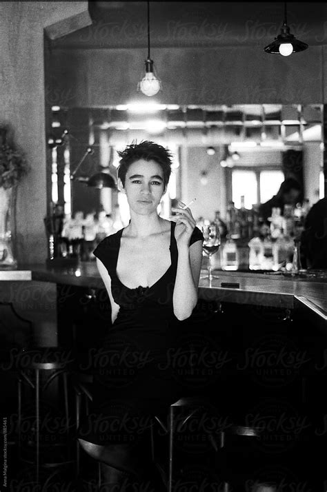 Babe Woman Smoking Cigarette In Bar By Stocksy Contributor Anna Malgina Stocksy