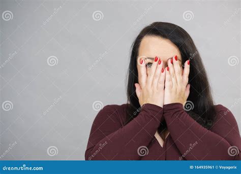 Woman Peeking Through Her Hands Stock Image Image Of Drama