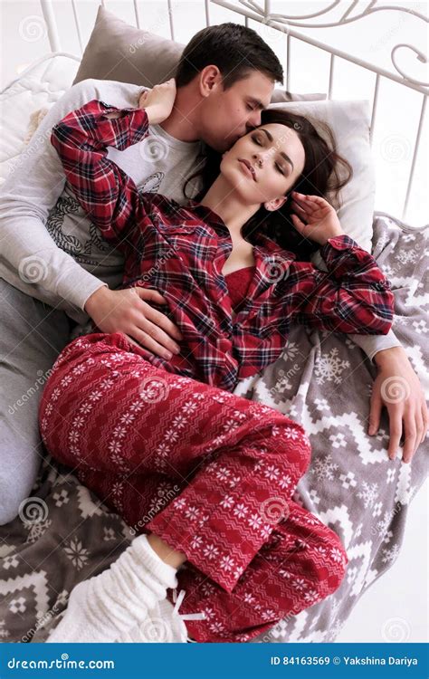 Tender Couple In Cozy Home Clothes Posing At Bedroom Stock Image Image Of Lady Bright 84163569