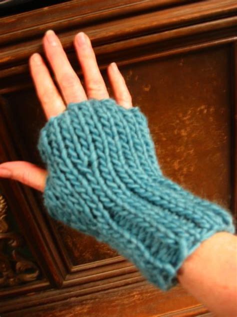 I came up with this pattern for two reasons: Julianne Fingerless Gloves | FaveCrafts.com
