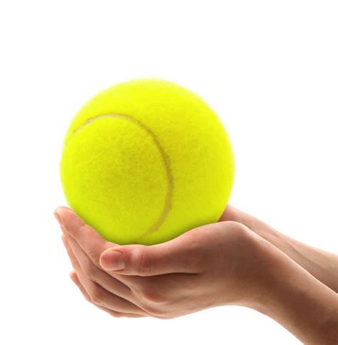 Premium Photo Hands Holding A Tennis Ball