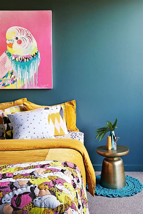 A blue feature wall painted in fired earth tempest adds some depth to this fresh and calming master bedroom. Dulux Angry Ocean | Colorful bedroom decor, Beautiful ...