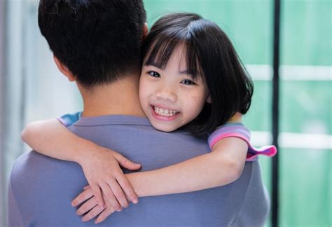 premium photo asian father and daughter at home