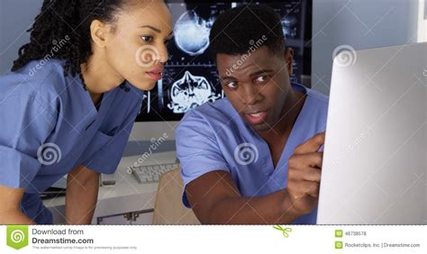 African American Medical Specialists Using Computers Stock Photo ...