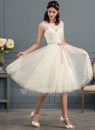 A Lineprincess Square Neckline Knee Length Tulle Wedding Dress With