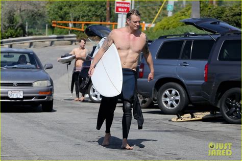 Photo Joel Kinnaman Shirtless Surfing At Beach Photo
