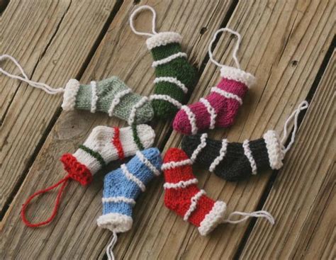 Late night christmas stocking is knit from the top down and features a foldover ribbing, an this pattern assumes that you know something about knitting in the round with magic loop or dpns. Mini Knit Christmas Stockings | AllFreeKnitting.com