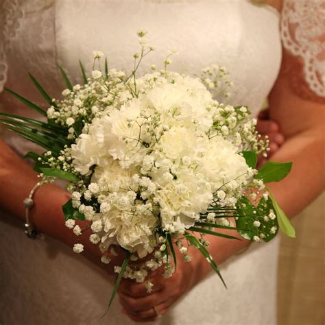 Maybe you would like to learn more about one of these? white carnations baby's breath wedding bouquet (With ...
