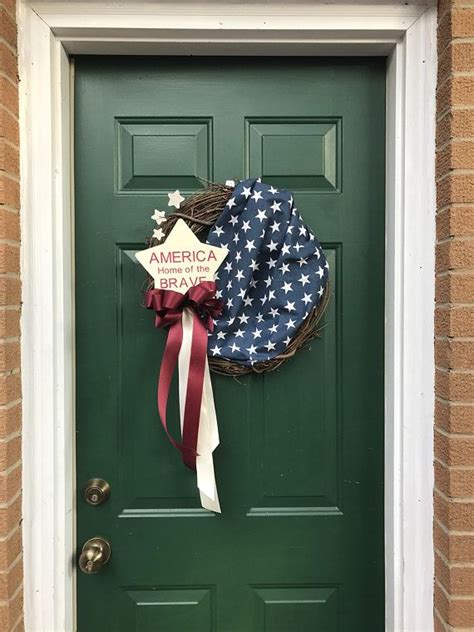 The spinning sign features a french style scroll bracket from which the sign will. Antique Looking American Flag Wreath-Patriotic Front Door ...