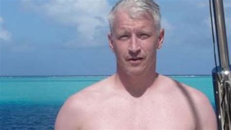 Andy Cohen Angers Anderson Cooper By Posting Shirtless Photos Of CNN