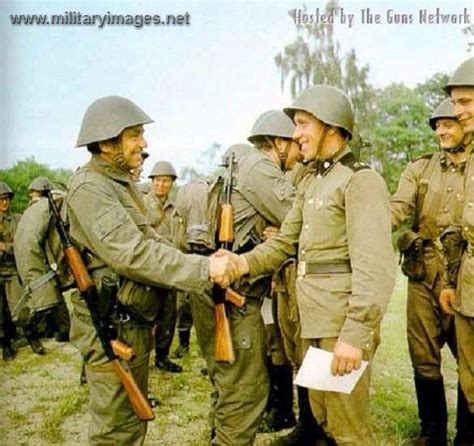 gdr soldier shaking hand of a soviet soldier military photos military history pictures of