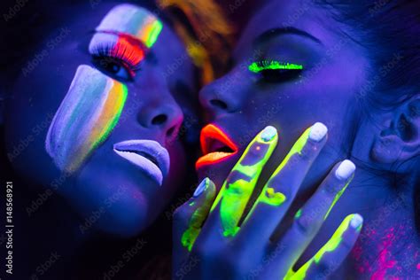 Sexy Lesbian Fashion Models Kissing In Uv Neon Light With Fluorescent