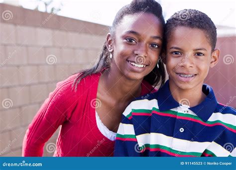 Happy African American Brother And Sister Smiling Stock Image Image