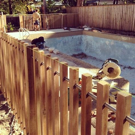 Modern Timber Pool Fence 40x40mm Battens With Steel Rail Diy Pool Fence Fence Around Pool