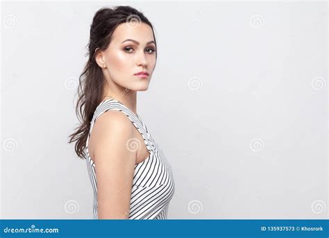 Profile Side View Portrait Of Serious Beautiful Young Brunette Woman