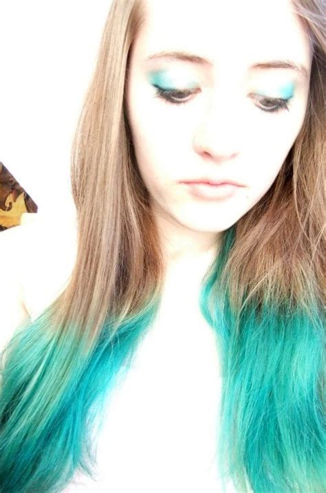 Dyeing your hair blue is a fun way to get out of a color rut. turquoise hair | Brown Hair with Blue Tips | Colored hair ...
