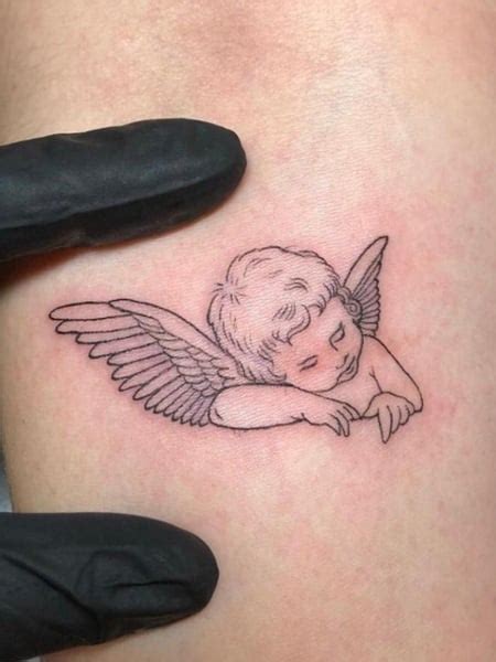 Sleeping Angel Tattoo Designs