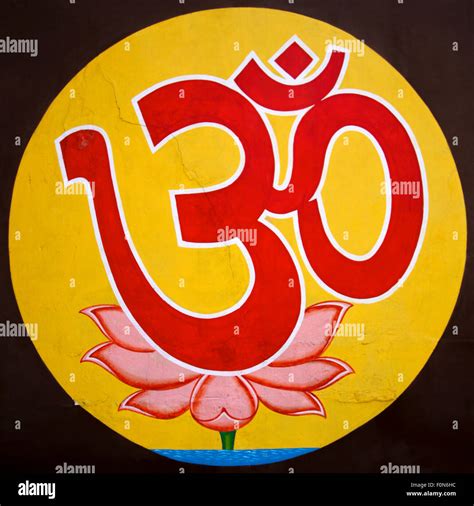 Yellow Aum Om The Holy Symbol On Dark Background Taken On A Wall In