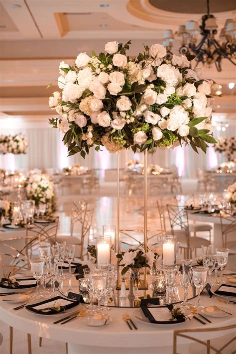 Centerpieces Designed By The Hidden Garden Featured Both High And Low