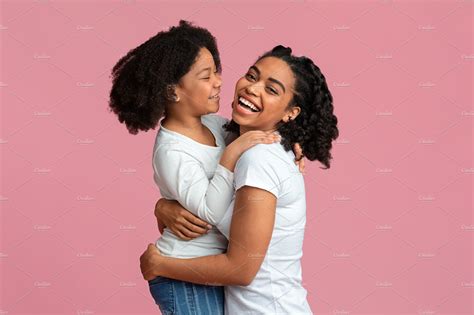 Loving Black Woman Embracing With He Background Stock Photos