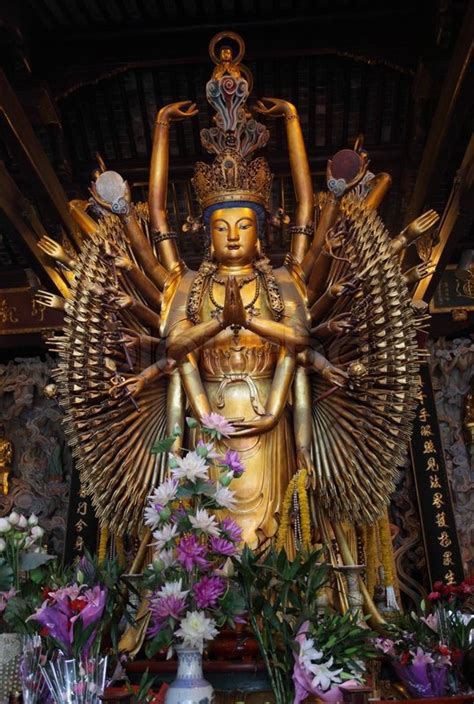 10 hindu gods, goddesses and yoga postures you need to know. Multi armed buddha statue in Longhua Temple, Shanghai ...