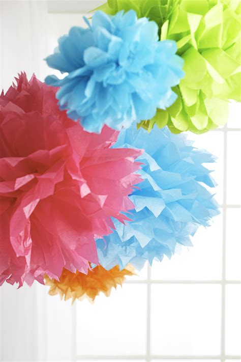 These Diy Pom Poms Are Simple Inexpensive Decorations Perfect For Baby