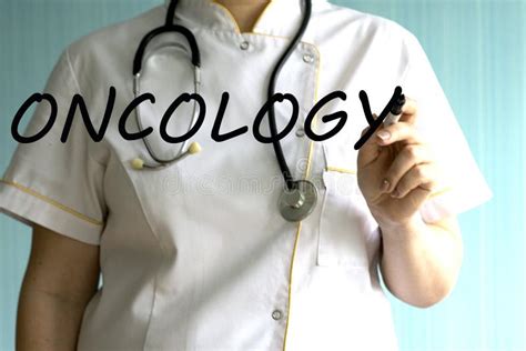 The Word Oncology On A Blue Background The Concept Of Diseases Of