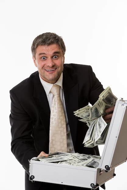 Premium Photo Surprised Man With A Suitcase Full Of Dollars Happy