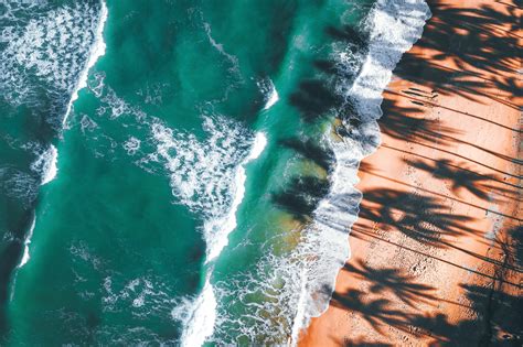 Aerial View Of Ocean Waves On Shore · Free Stock Photo