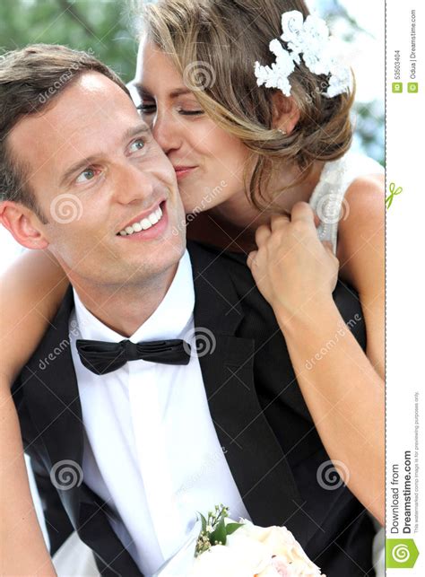 Bride Kissing Her Groom Stock Photo Image Of Pickaback 53503404